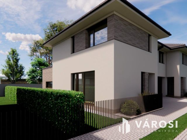 Debrecen csendes kertvárosi részén ELADÓ IKERHÁZ